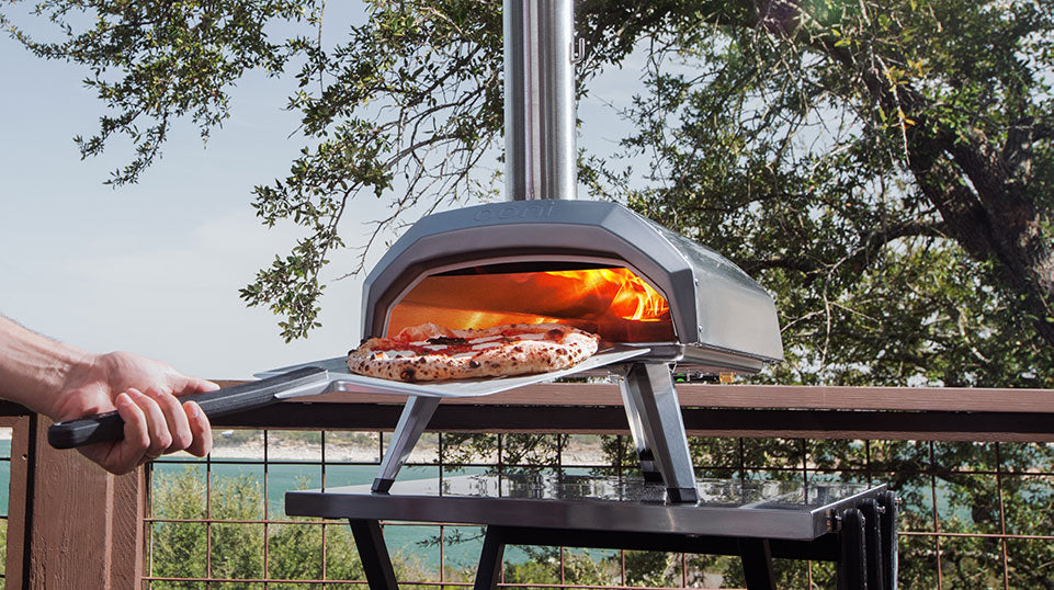 Wood fired outdoor pizza ovens, accessories to heat up summer